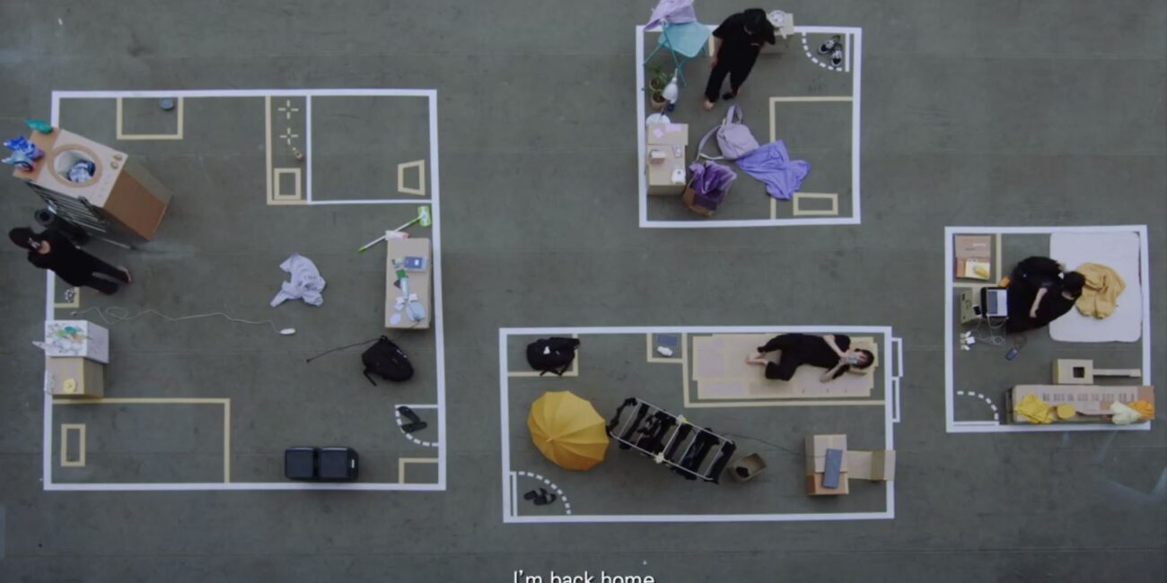 An aerial view of a room with people in it.